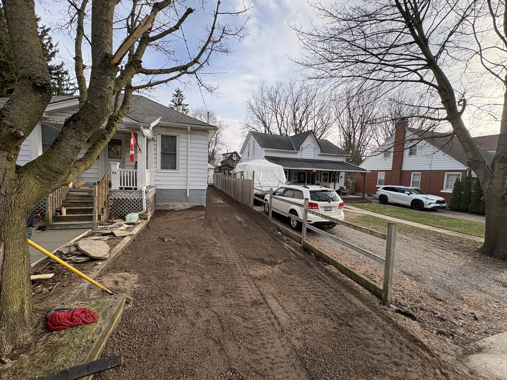Dirt prep to fresh asphalt – before